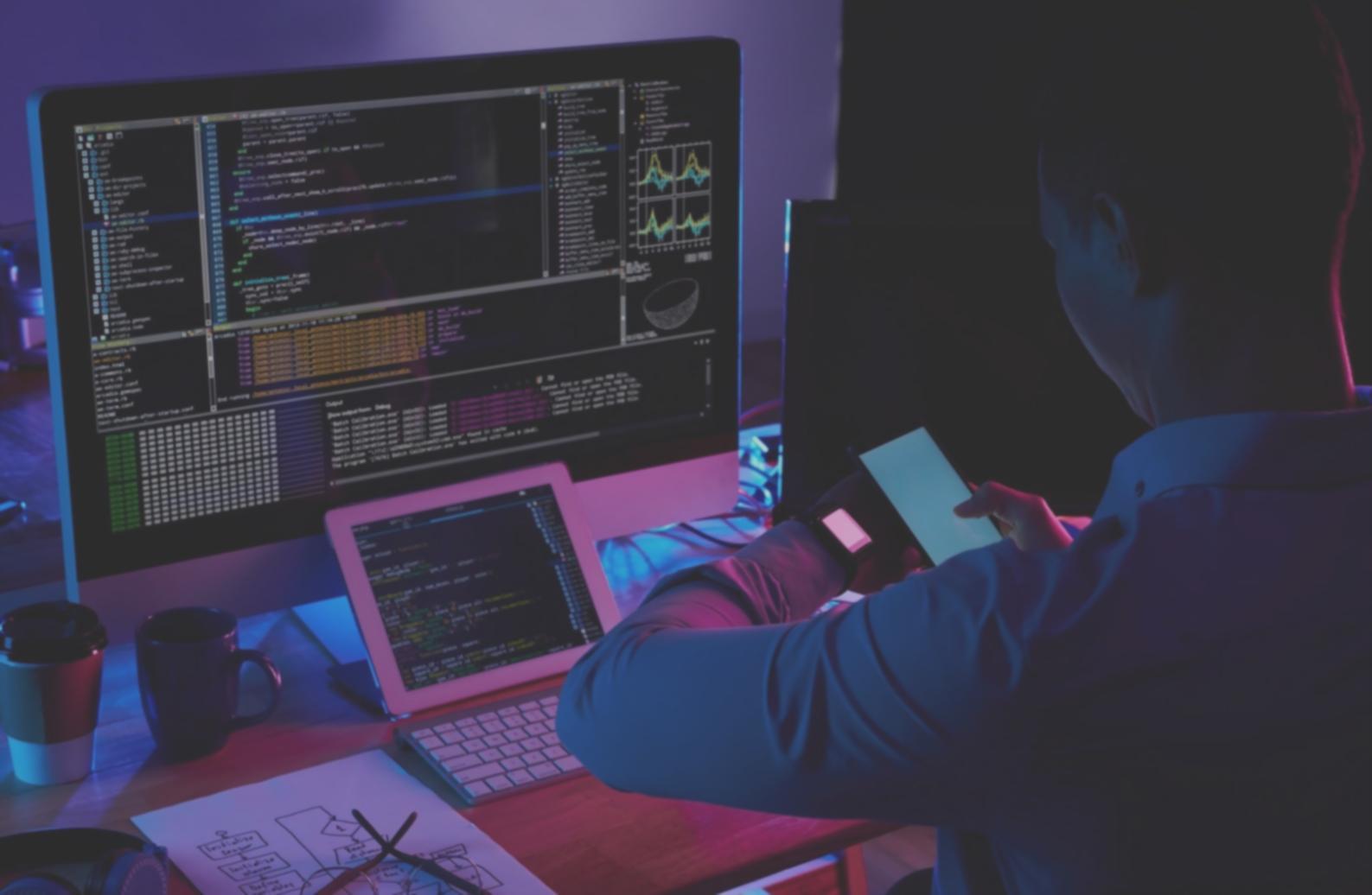 Desktop software testing coordination meeting with development team reviewing user feedback